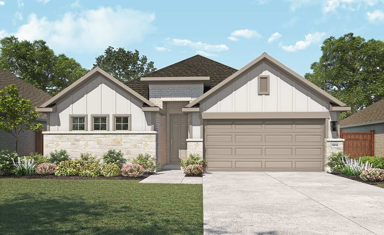Modern single-story home with stone facade and gabled roof in Oakwood Estates. Well-manicured lawn and shrubs.