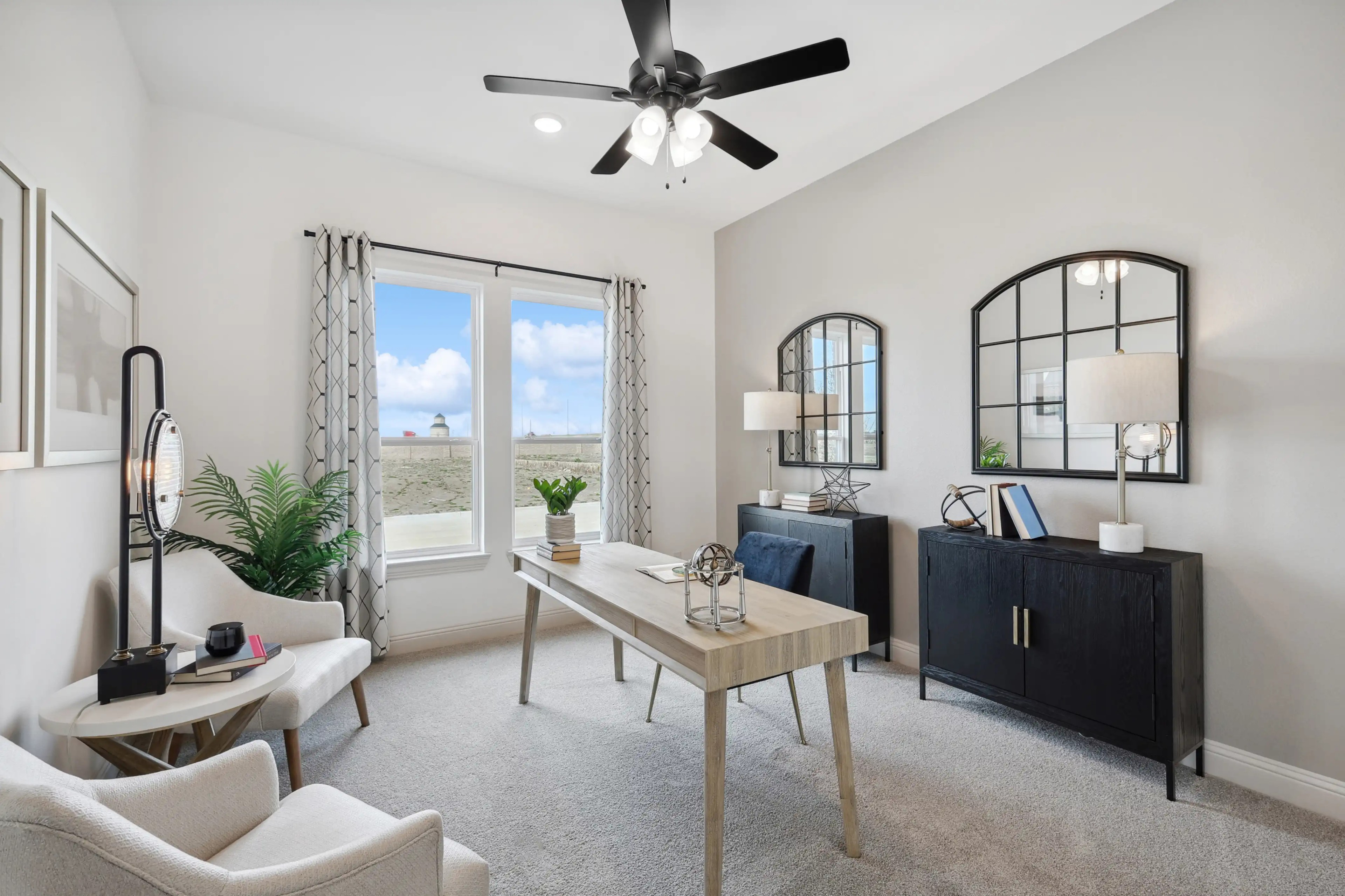 Modern study room with sleek desk, large windows, stylish decor, Westside Preserve community.