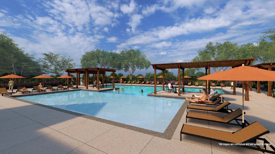 Luxury pool with pergolas, sun loungers, and orange umbrellas in Churchill community.